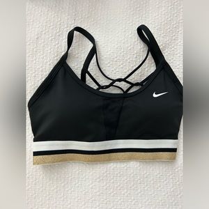 Nike black and gold sports bra
